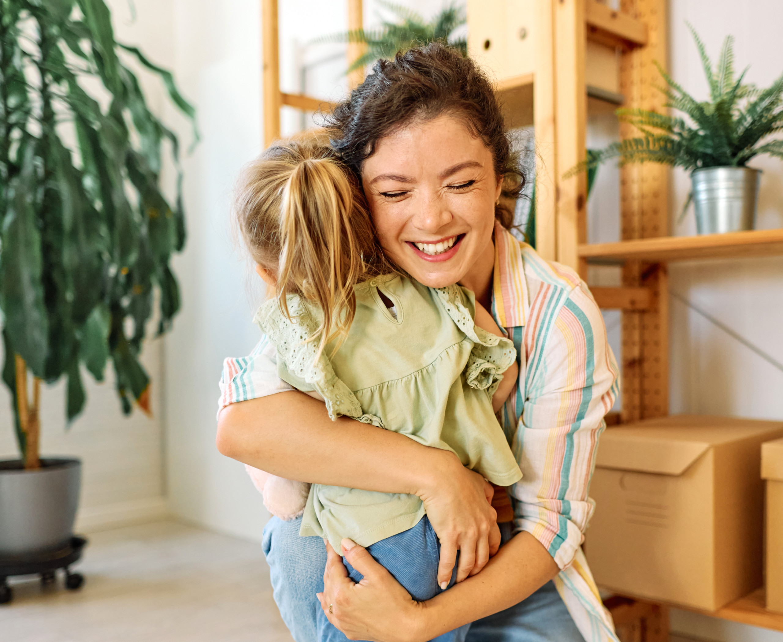 Portrait,Of,Mother,And,Daughter,Having,Fun,,Running,And,Hugging